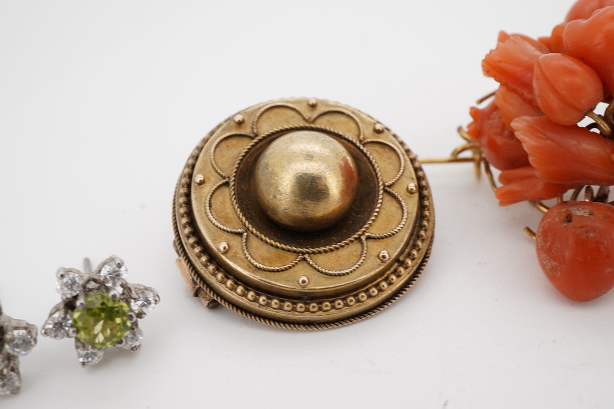 A group of three brooches to include a Victorian yellow metal target brooch, a cultured pearl and coral 9ct wreath brooch and a 19th century carved coral cluster brooch, together with a pair of peridot and white paste se